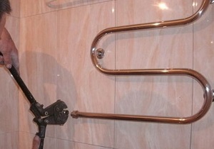 Демонтаж полотенцесушителя в ванной в Мценске